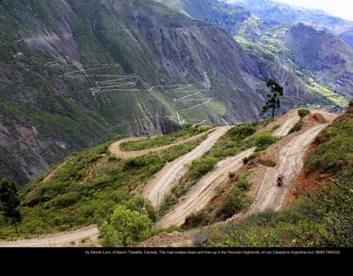 March: by Alberto Lara; of Naomi Tweddle, Canada. The road snakes down and then up in the Peruvian Highlands, on our Canada to Argentina tour; BMW F800GS.