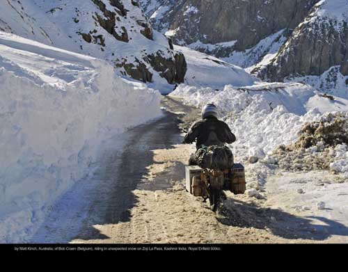 December: by Matt Kinch, Australia; of Bob Craen (Belgium), riding in unexpected snow on Zoji La Pass, Kashmir India; Royal Enfield 500cc.