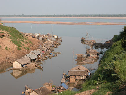 Floating fishing village on a Mekong tributary