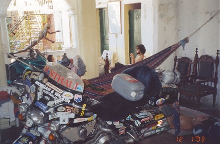 Bike and backpackers sleep together in this cramped hostal