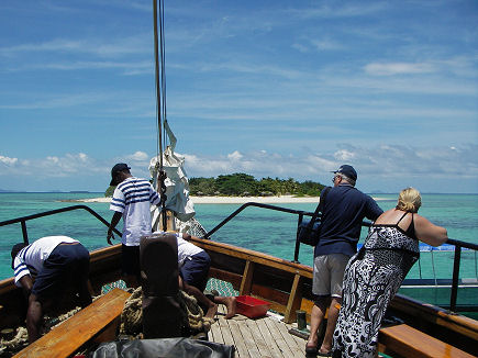 Arriving at a sandy coral atoll