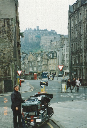 Edinburgh Castle on the hill between the old city buildings