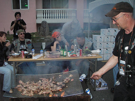 Bob cooking a Korean style barbecue at the rally