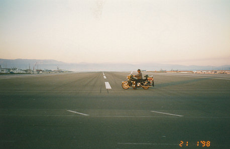 Riding across the airstrip and into Gibraltar