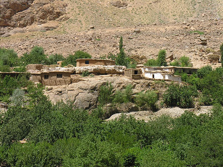 Afghan village across the river border