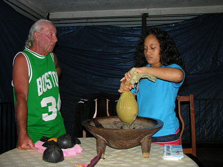 Toni and Liliosa preparing the kava for drinking