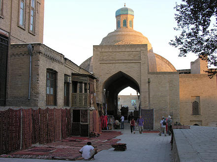 Carpet selling from 16th Century buildings in Bukhara