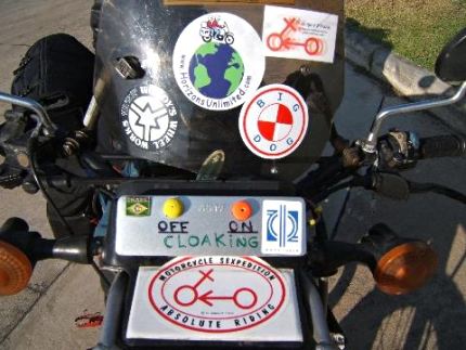 The Motorcycle Sexpedition sticker on the front of my motorcycle has also been seen on Yamaha, Honda, Suzuki, Ducati, BMW, and Indian motorcycles around the world.  I have not seen one yet on a Harley-Davidson but that might be because they vibrate off.  Above the sticker is the Cloaking Device.  See below for more on how it works.
