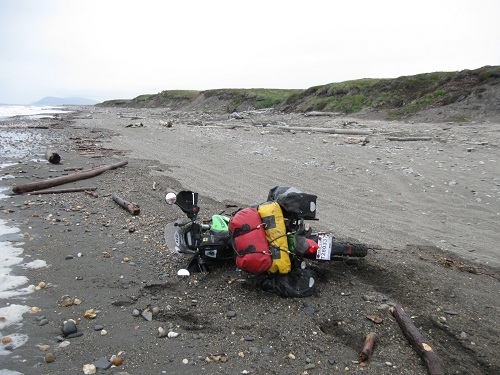 The road to Teller included an optional route along the beach, where I learned that when a wave washed a log into the front wheel at the wrong angle the result was 'down, again.'