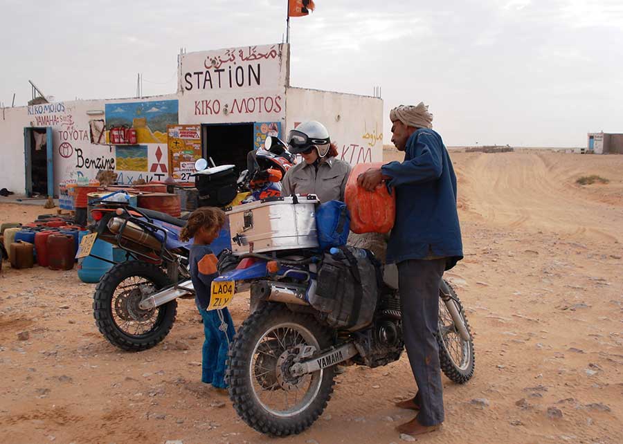 Photo by Lois Pryce, fueling up in Tunisia