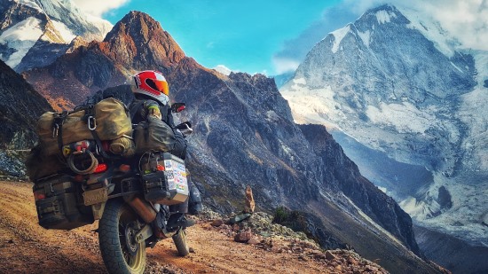 Rose Padilla and Chad Horton, Cordillera Blanca mountain view from motorcycle.