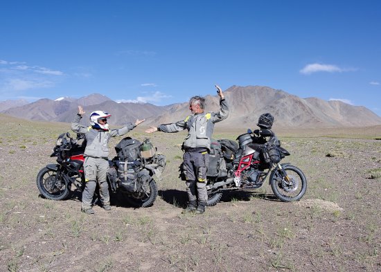 Marianne Pitre and Andre Reboux, Bartang with two motorcycles.