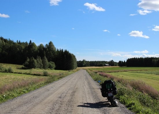 Lukas Federer' motorcycle parked on a dirt road.