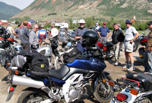 Who is doing it right? Grant Johnson looked over the motorcycle preparation options in the parking lot at the HU Traveller’s Meeting in Silverton, Colorado, questioning some while acknowledging others. 