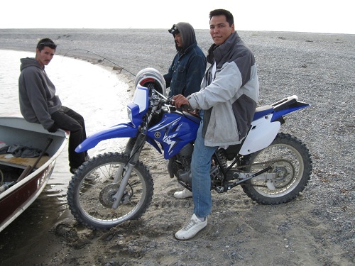 The road and expedition ended at Teller.  To push further north and west meant loading the motorcycle on a fishing boat like this fellow did, then ride on the beach to Wales, where further travel was going to come to a halt unless I chartered a flight or boat to illegally drop me on the shore of Russia.