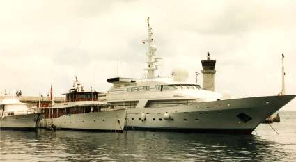 Several "small" boats in the harbor in Monaco.