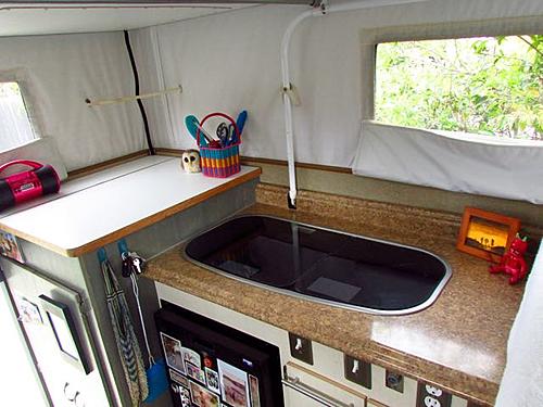 FOR SALE (USA): Phoenix PULSE Pop-Up Truck Camper-pantrycoveredsinkstove.jpg