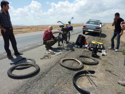 Tire repair by side of road, Iran.